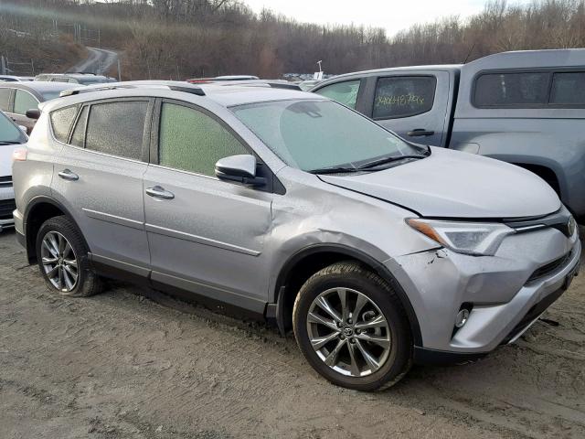 JTMDFREV1JJ192324 - 2018 TOYOTA RAV4 LIMIT SILVER photo 1