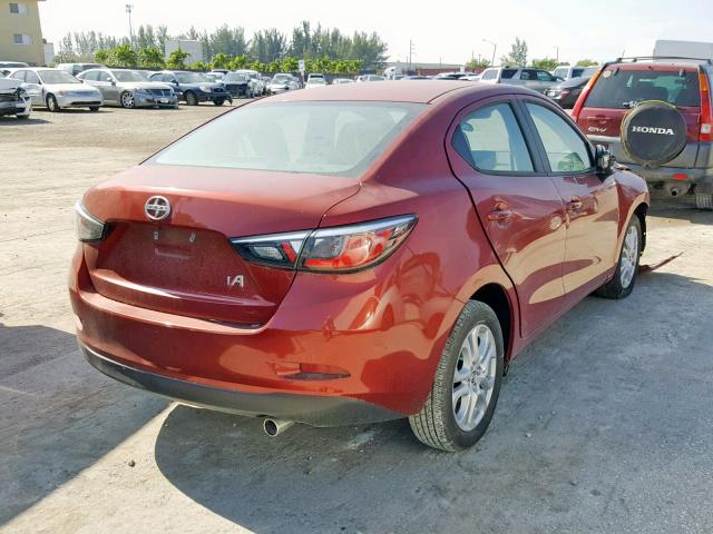 3MYDLBZV1GY138117 - 2016 TOYOTA SCION IA RED photo 4