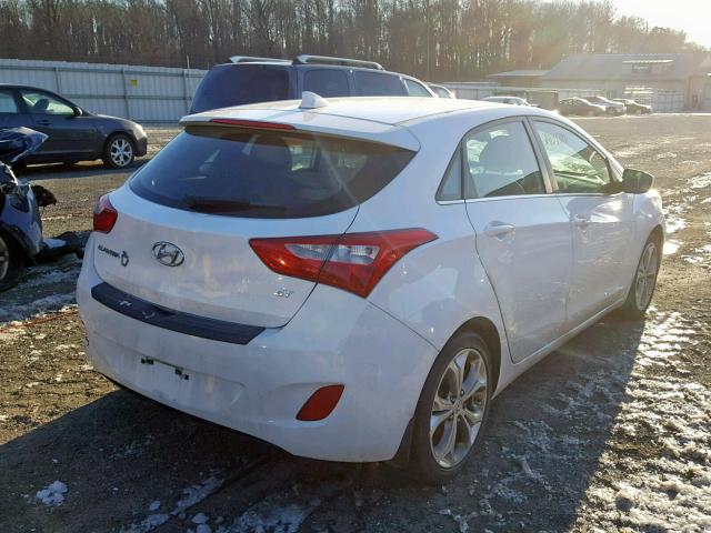 KMHD35LE9DU103358 - 2013 HYUNDAI ELANTRA GT WHITE photo 4