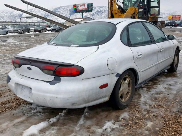 1FAFP53U4XG137483 - 1999 FORD TAURUS SE WHITE photo 4