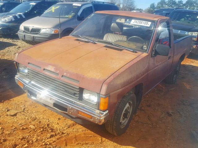 1N6ND11SXHC335418 - 1987 NISSAN D21 SHORT ORANGE photo 2