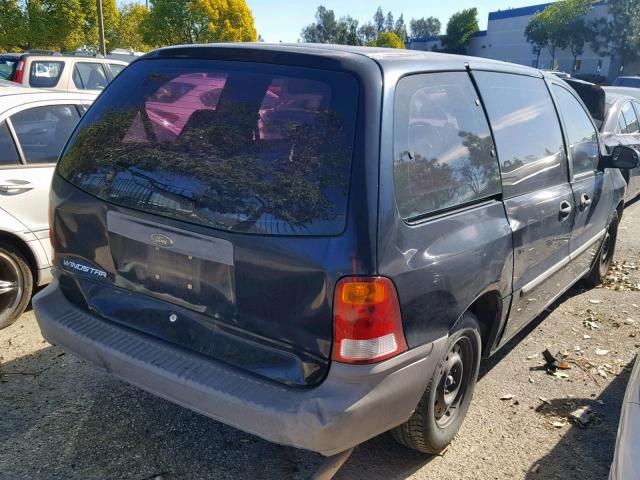 2FMZA51U4XBA23398 - 1999 FORD WINDSTAR W BLACK photo 4