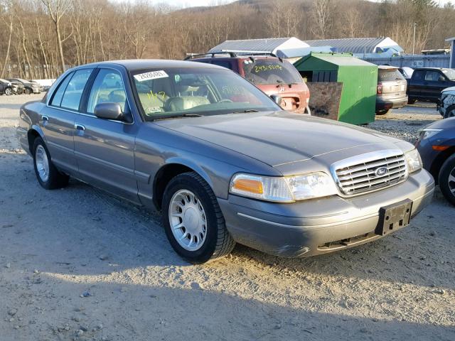 2FAFP74W1YX149842 - 2000 FORD CROWN VICT GRAY photo 1