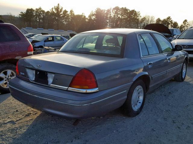 2FAFP74W1YX149842 - 2000 FORD CROWN VICT GRAY photo 4