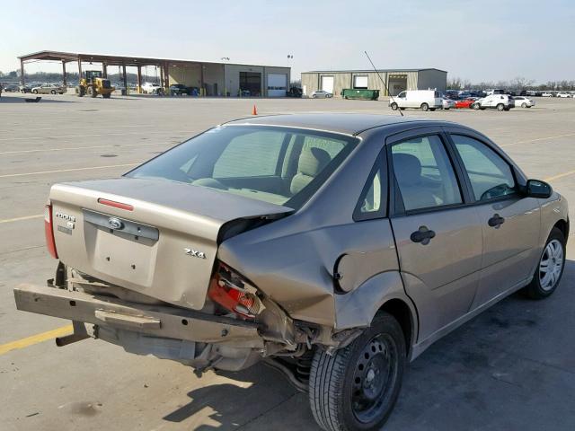 1FAFP34N95W140927 - 2005 FORD FOCUS ZX4 GOLD photo 4