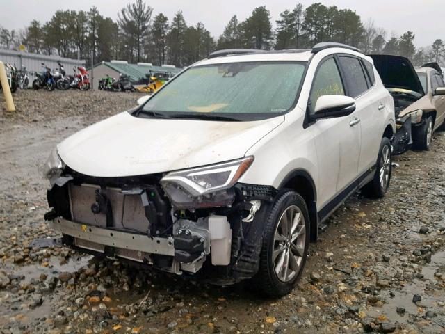 JTMDFREV1HJ700673 - 2017 TOYOTA RAV4 LIMIT WHITE photo 2