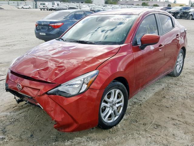 3MYDLBZVXGY109392 - 2016 TOYOTA SCION IA RED photo 2