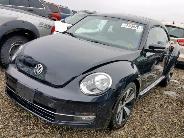 3VWV67AT0CM653755 - 2012 VOLKSWAGEN BEETLE TUR BLACK photo 2