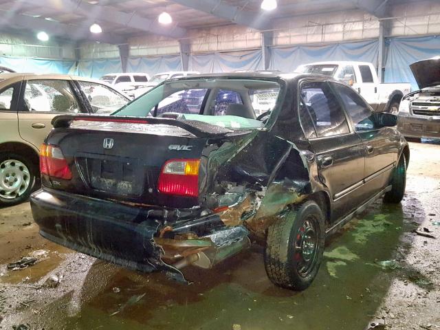 1HGEJ6677XL055632 - 1999 HONDA CIVIC LX BLACK photo 4