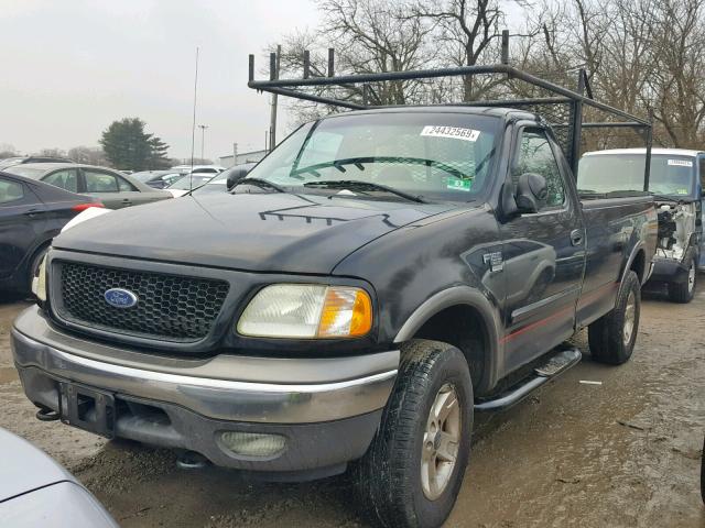 1FTRF18W02NA71967 - 2002 FORD F150 BLACK photo 2