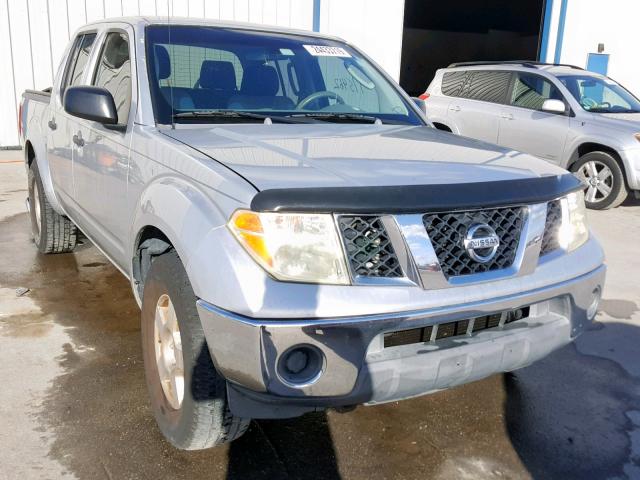 1N6AD07U46C414565 - 2006 NISSAN FRONTIER C SILVER photo 1