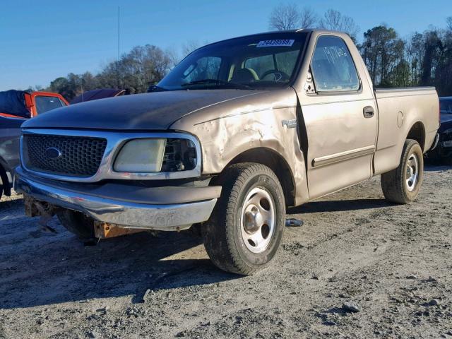 2FTRF17264CA12333 - 2004 FORD F-150 HERI GOLD photo 2