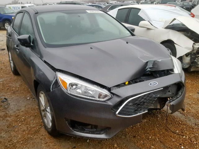 1FADP3F2XFL385118 - 2015 FORD FOCUS SE SILVER photo 1