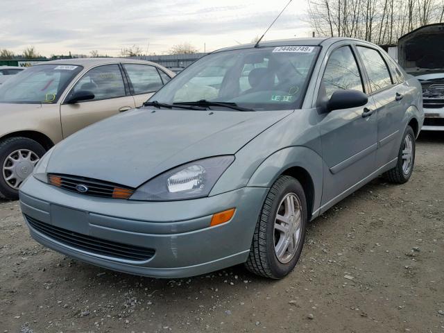 1FAFP343X4W181032 - 2004 FORD FOCUS SE C GREEN photo 2