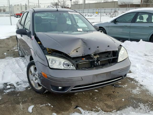 1FAHP34N87W285825 - 2007 FORD FOCUS ZX4 GRAY photo 1