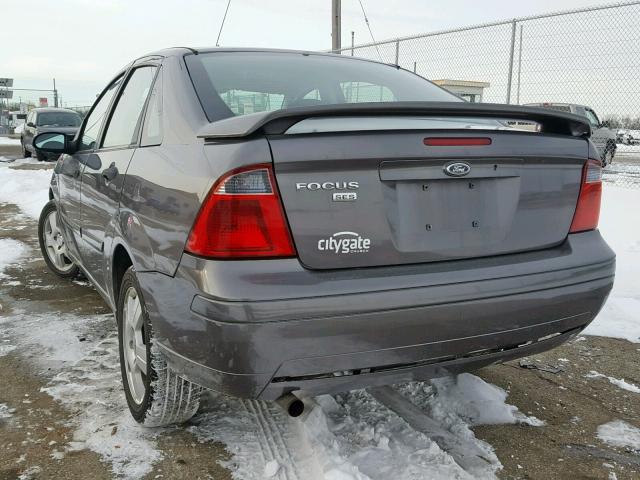 1FAHP34N87W285825 - 2007 FORD FOCUS ZX4 GRAY photo 3