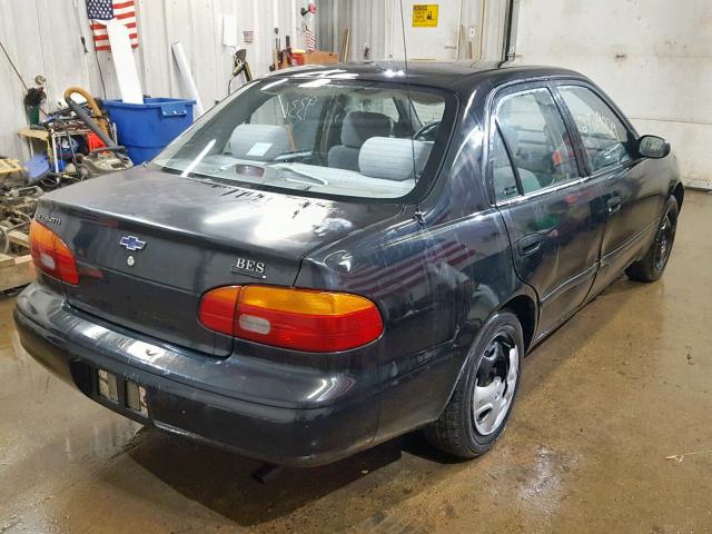 1Y1SK52851Z427458 - 2001 CHEVROLET GEO PRIZM BLACK photo 4