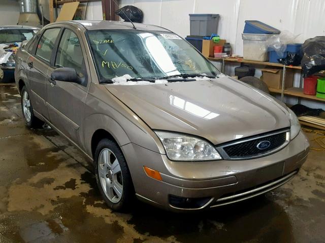 1FAFP34N95W272733 - 2005 FORD FOCUS ZX4 BROWN photo 1