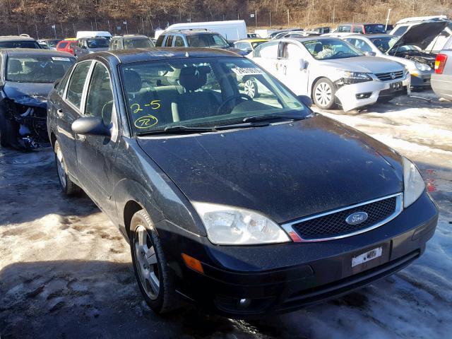 1FAHP34NX7W359942 - 2007 FORD FOCUS ZX4 BLACK photo 1