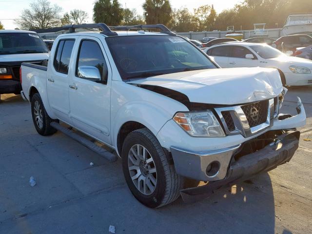 1N6AD07UX9C404451 - 2009 NISSAN FRONTIER C WHITE photo 1