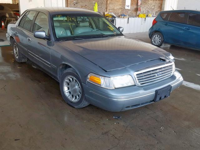 2FAFP74W9XX122564 - 1999 FORD CROWN VICT GRAY photo 1