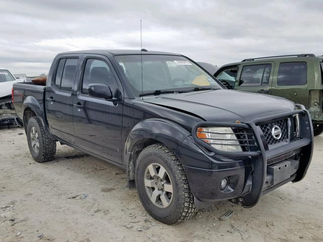 1N6AD07W79C412556 - 2009 NISSAN FRONTIER C BLACK photo 1