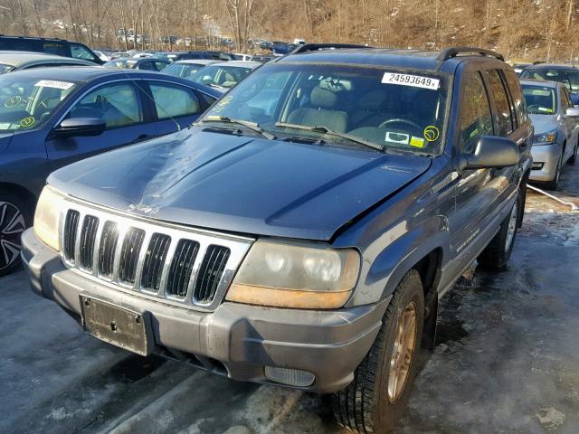 1J8GW48N12C182306 - 2002 JEEP GRAND CHER BLUE photo 2