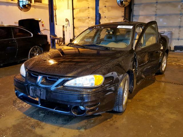 1G2NV52E4YM723663 - 2000 PONTIAC GRAND AM G BLACK photo 2