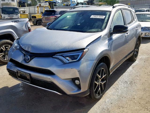 JTMJJREV0HD086277 - 2017 TOYOTA RAV4 HV SE SILVER photo 2