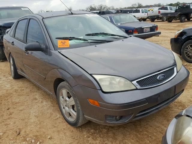 1FAFP34NX5W206031 - 2005 FORD FOCUS ZX4 GRAY photo 1