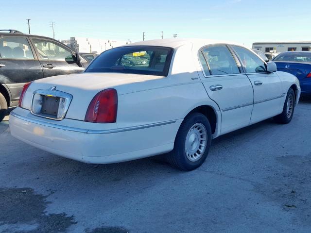 1LNHM82W2XY699999 - 1999 LINCOLN TOWN CAR S WHITE photo 4