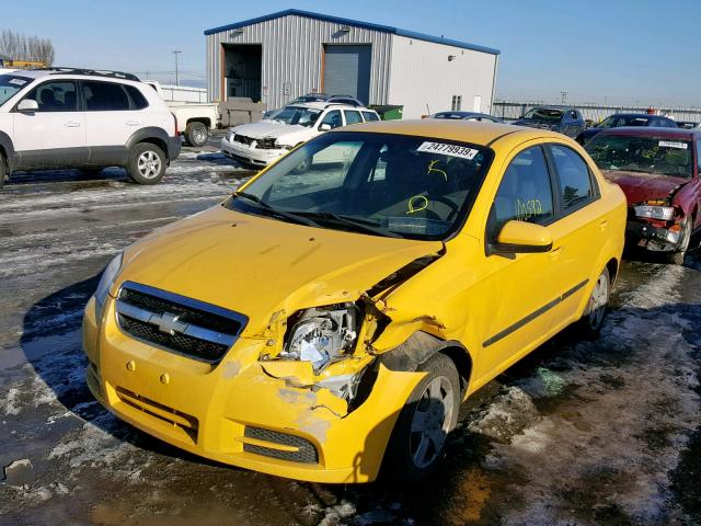 KL1TD5DE5AB128963 - 2010 CHEVROLET AVEO LS YELLOW photo 2