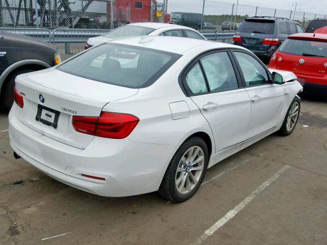 WBA8E5G31HNU44548 - 2017 BMW 320 XI WHITE photo 4