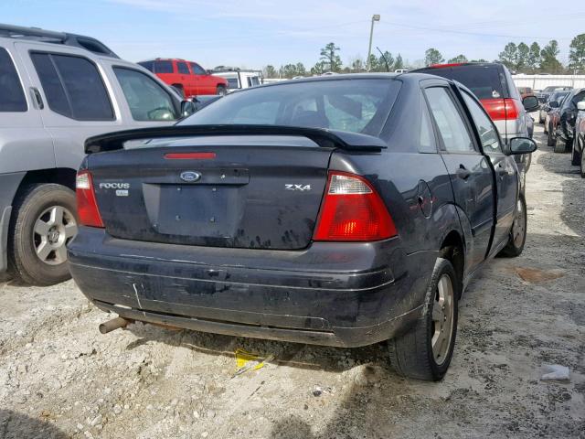 1FAFP34N86W245394 - 2006 FORD FOCUS ZX4 BLACK photo 4