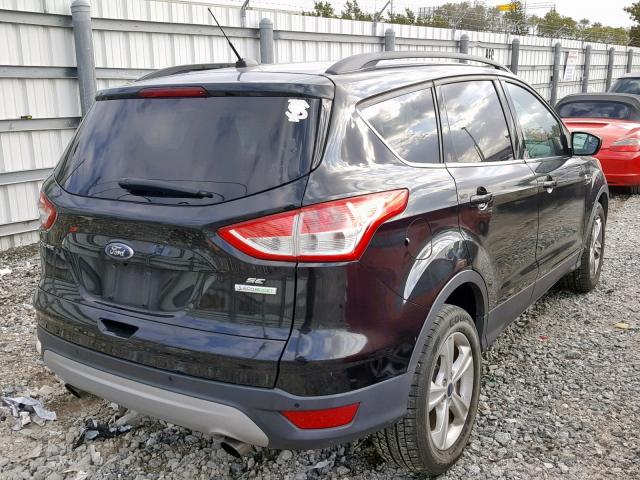 1FMCU0GX4EUC69375 - 2014 FORD ESCAPE SE BLACK photo 4