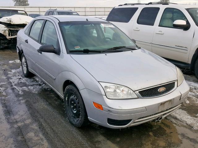 1FAFP34N95W257875 - 2005 FORD FOCUS ZX4 GRAY photo 1