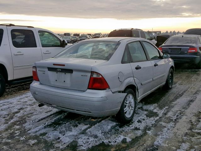 1FAFP34N95W257875 - 2005 FORD FOCUS ZX4 GRAY photo 4