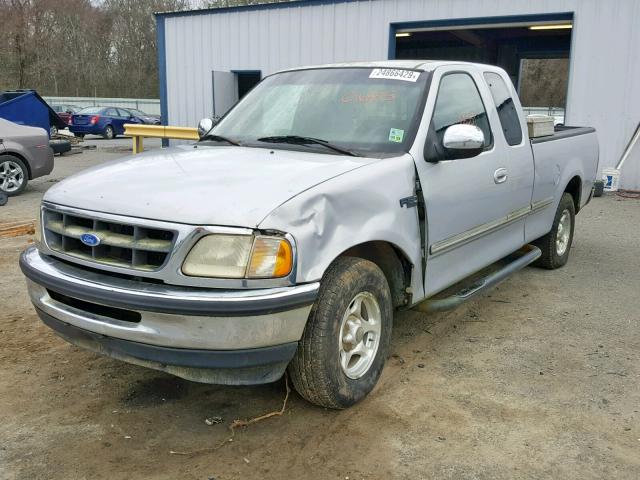 1FTDX17W6VNC16975 - 1997 FORD F150 SILVER photo 2