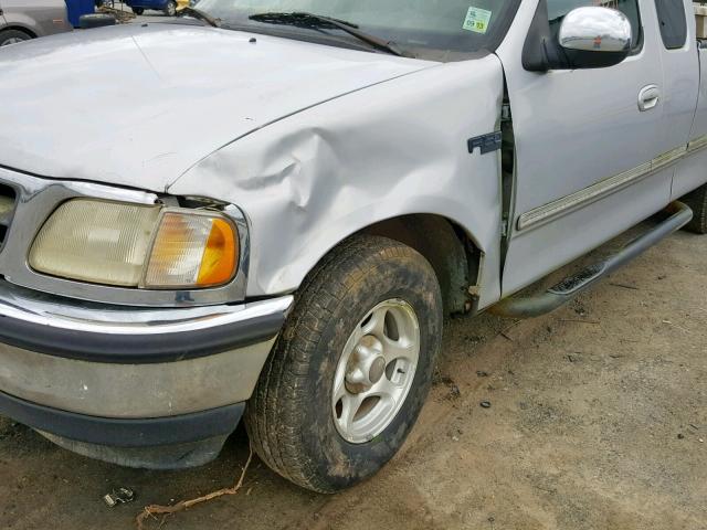 1FTDX17W6VNC16975 - 1997 FORD F150 SILVER photo 9