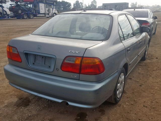 2HGEJ6670XH566922 - 1999 HONDA CIVIC LX BLUE photo 4