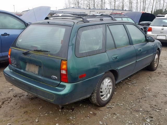 3FAFP15P5XR199886 - 1999 FORD ESCORT SE GREEN photo 4