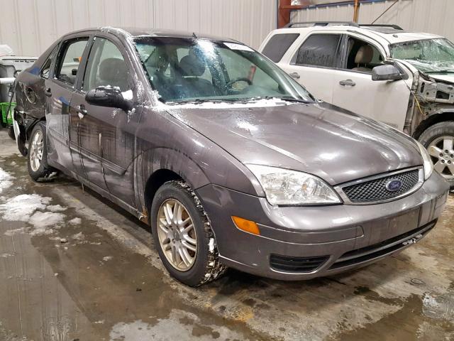 1FAFP34N75W289594 - 2005 FORD FOCUS ZX4 GRAY photo 1