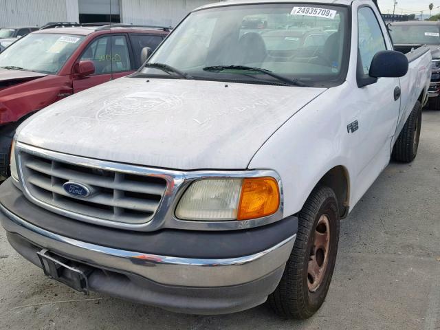 2FTRF17214CA48253 - 2004 FORD F-150 HERI WHITE photo 2