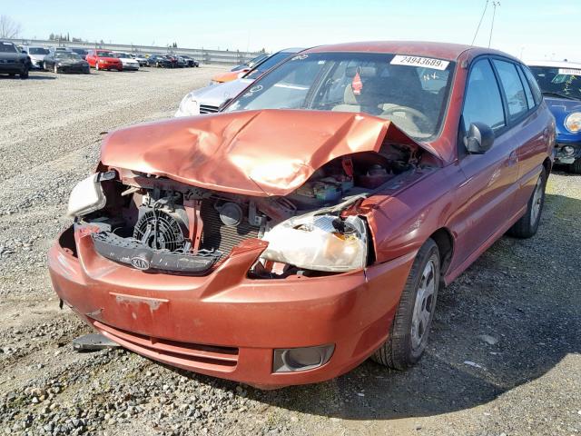 KNADC165036171282 - 2003 KIA RIO CINCO ORANGE photo 2