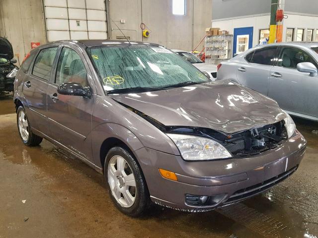 1FAHP37N97W222597 - 2007 FORD FOCUS ZX5 GRAY photo 1