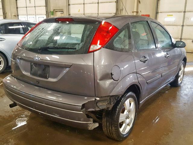 1FAHP37N97W222597 - 2007 FORD FOCUS ZX5 GRAY photo 4