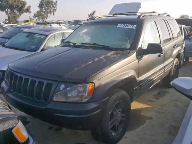 1J4GW68SXXC670549 - 1999 JEEP GRAND CHER BLACK photo 2