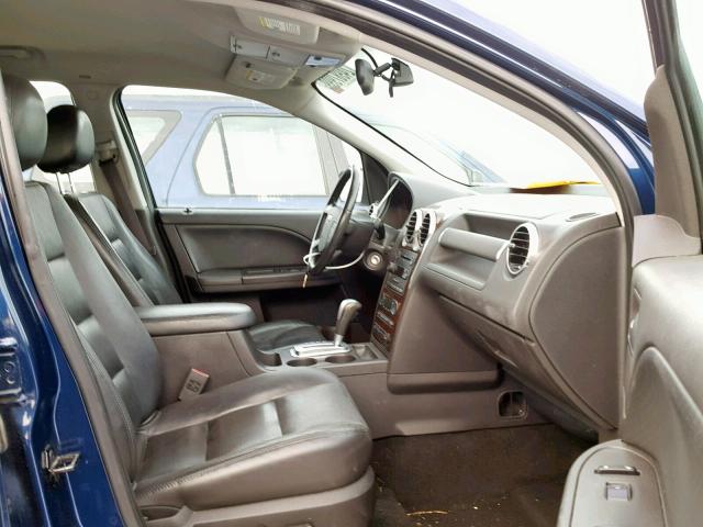 1FMDK06145GA78769 - 2005 FORD FREESTYLE BLUE photo 5