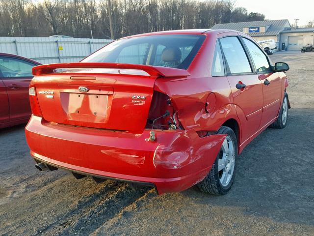 1FAHP34N16W215730 - 2006 FORD FOCUS ZX4 RED photo 4