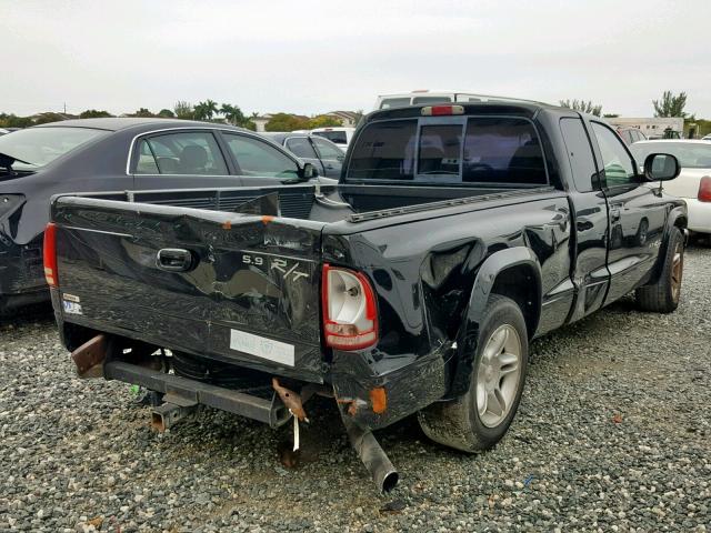 1B7GL22Z5XS109386 - 1999 DODGE DAKOTA BLACK photo 4